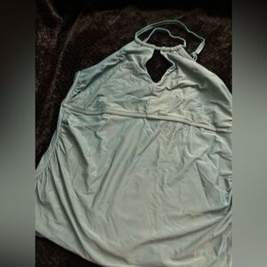 Sleeveless green top